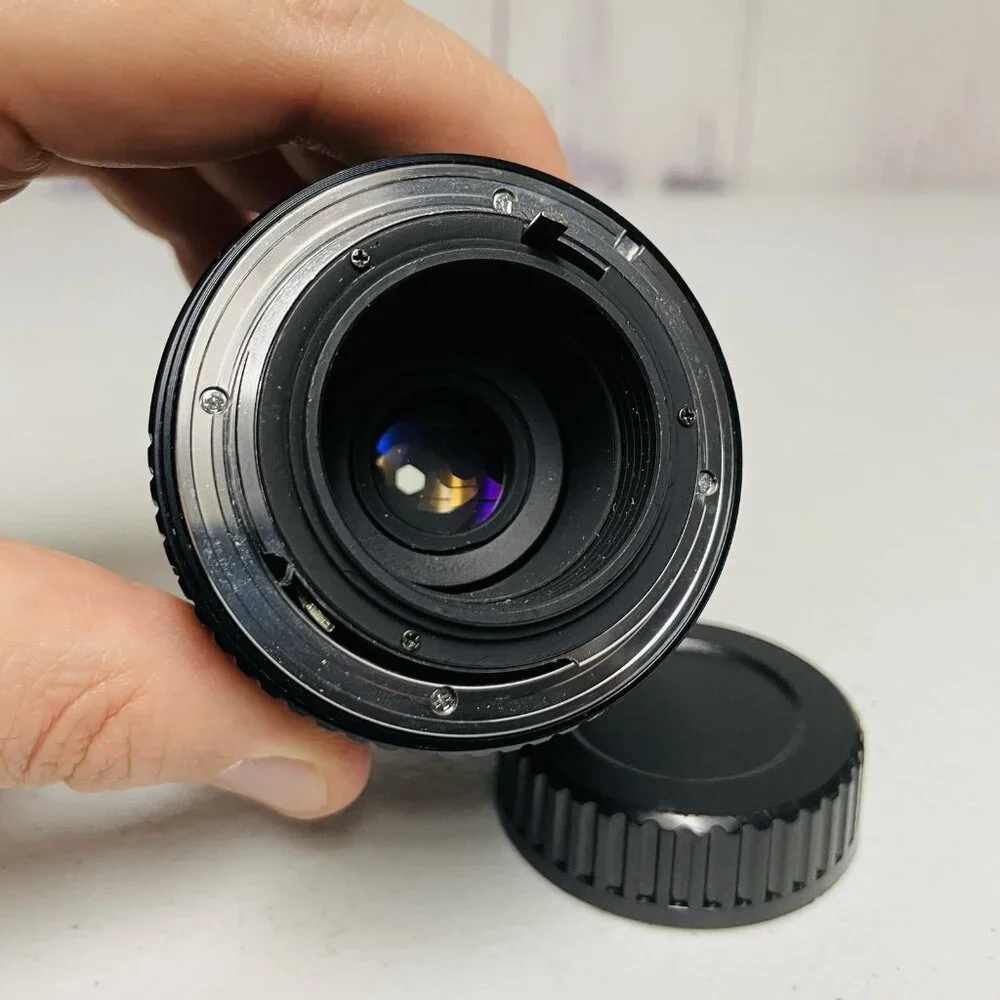 RKN MC AUTO ZOOM 1:3.5-4.5 f=35-70MM CAMERA LENS